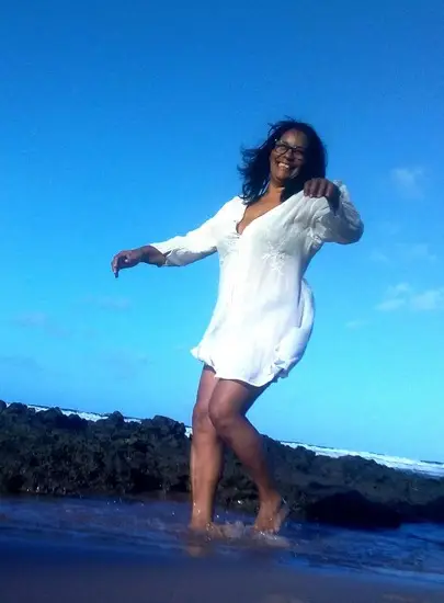 Happy woman enjoying freedom and health benefits with HepatoBurn liver detox supplementfreedom